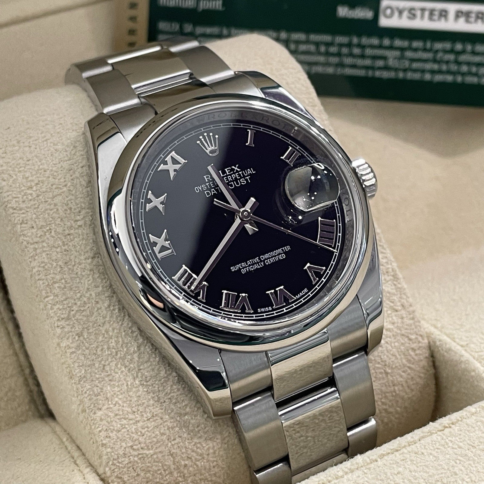 ROLEX DATEJUST 36mm BLACK ROMAN DIAL OYSTERSTEEL SMOOTH BEZEL ref: 116200