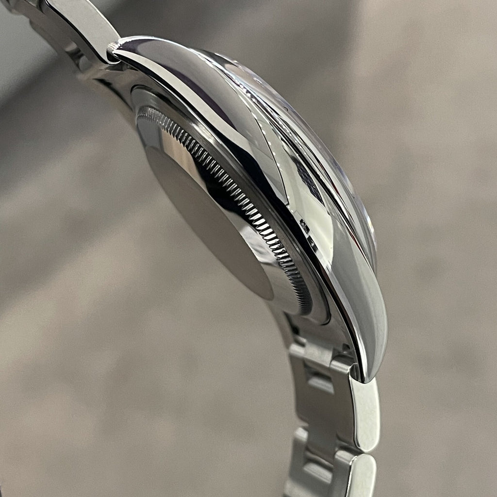 ROLEX OYSTER PERPETUAL 36mm TURQUOISE BLUE CELEBRATION DIAL ref: 116000