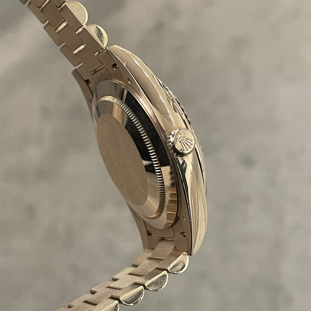 ROLEX DAY-DATE 40mm SUNDUST DIAMOND DIAL ROSE GOLD PRESIDENTIAL ref: 228235