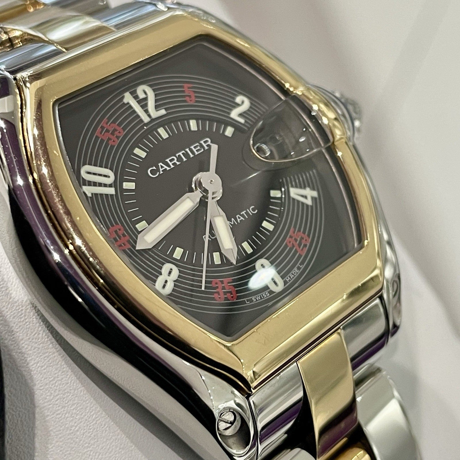 CARTIER ROADSTER LARGE BLACK ROULETTE DIAL YELLOW GOLD STAINLESS ref: W62031Y4