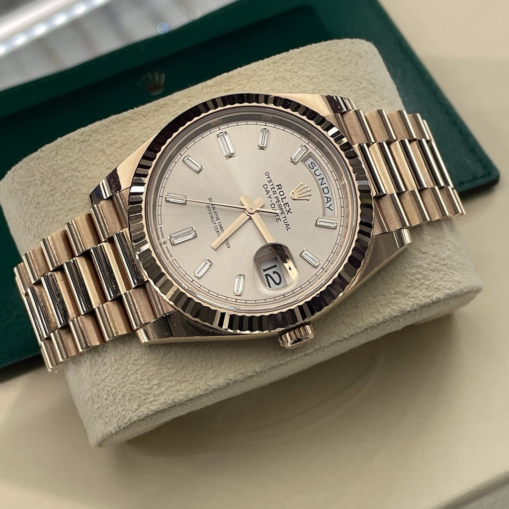 ROLEX DAY-DATE 40mm SUNDUST DIAMOND DIAL ROSE GOLD PRESIDENTIAL ref: 228235