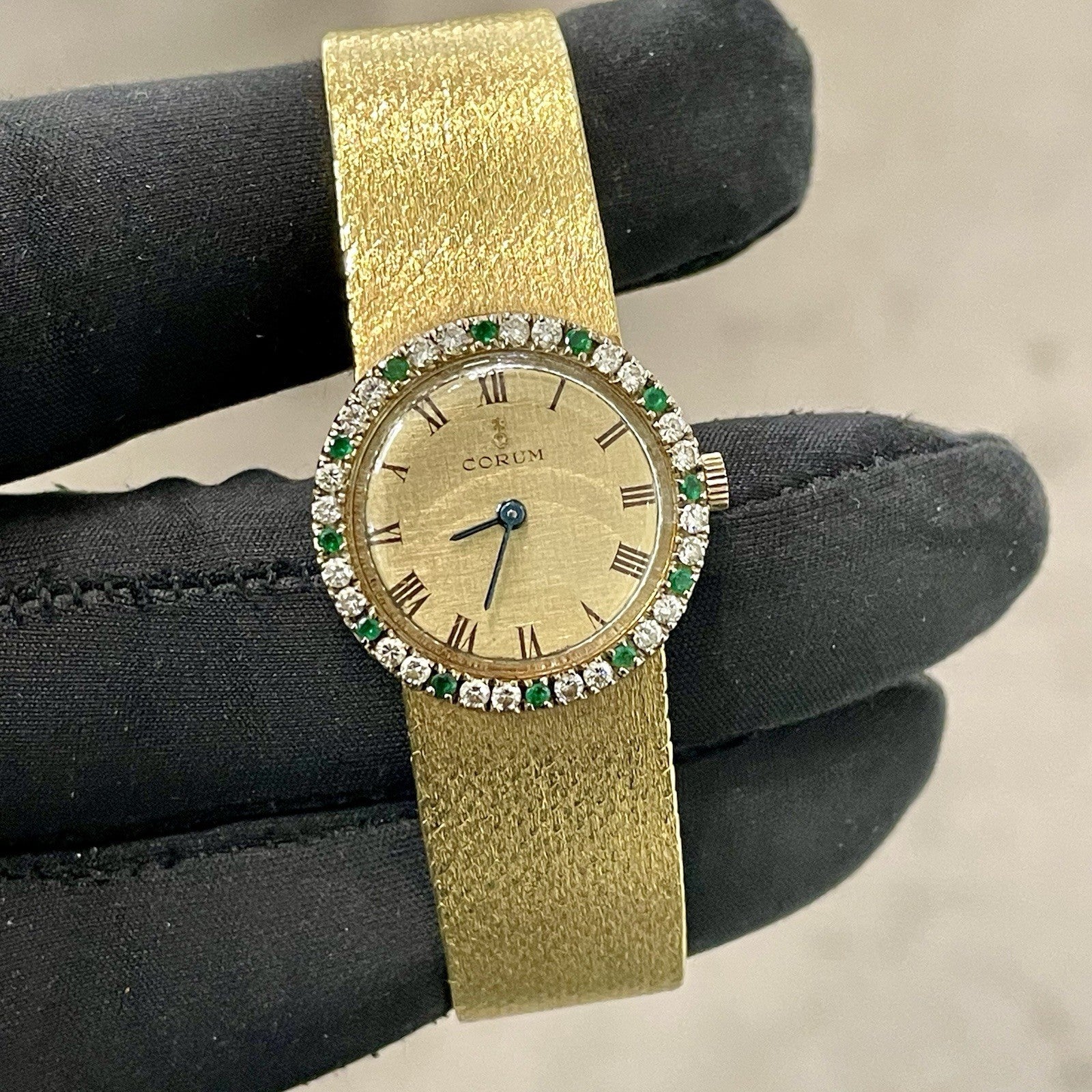 CORUM VINTAGE 24mm YELLOW GOLD DIAMONDS AND EMERALDS ref: 27307