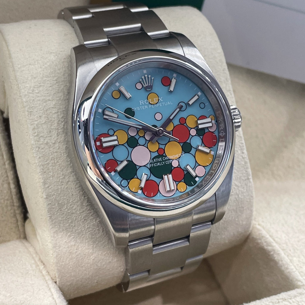 ROLEX OYSTER PERPETUAL 36mm TURQUOISE BLUE CELEBRATION DIAL ref: 116000