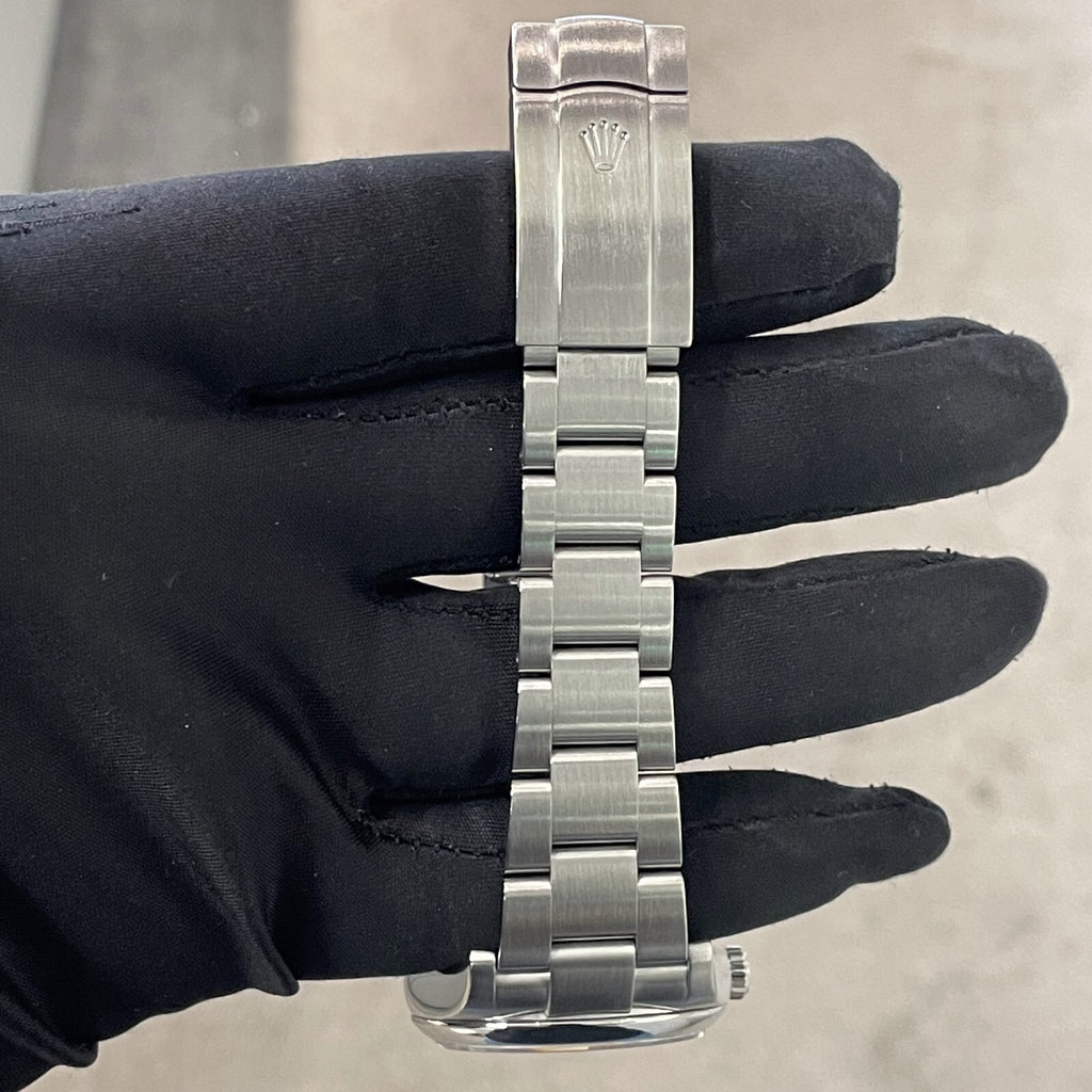 ROLEX OYSTER PERPETUAL 36mm TURQUOISE BLUE CELEBRATION DIAL ref: 116000