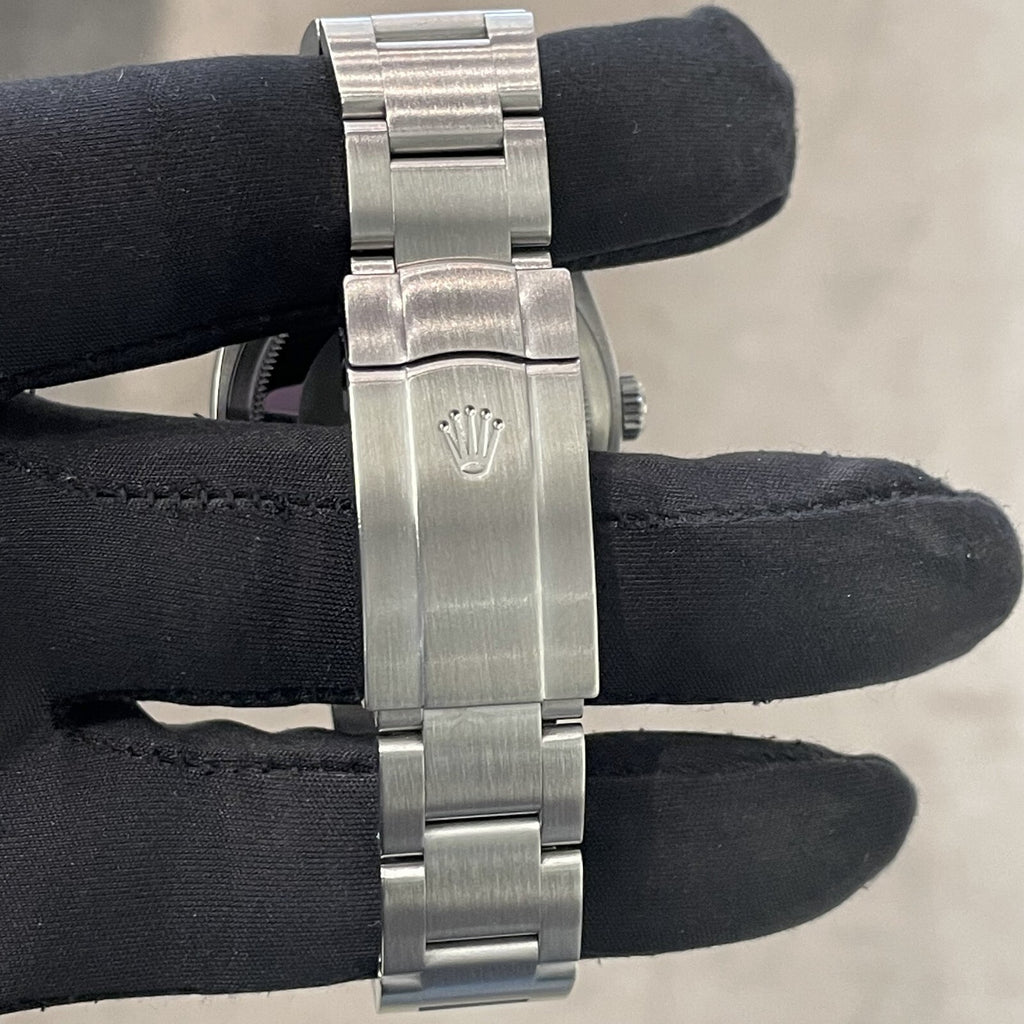 ROLEX OYSTER PERPETUAL 36mm TURQUOISE BLUE CELEBRATION DIAL ref: 116000