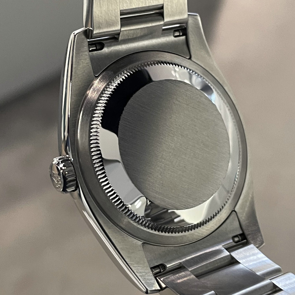 ROLEX OYSTER PERPETUAL 36mm TURQUOISE BLUE CELEBRATION DIAL ref: 116000