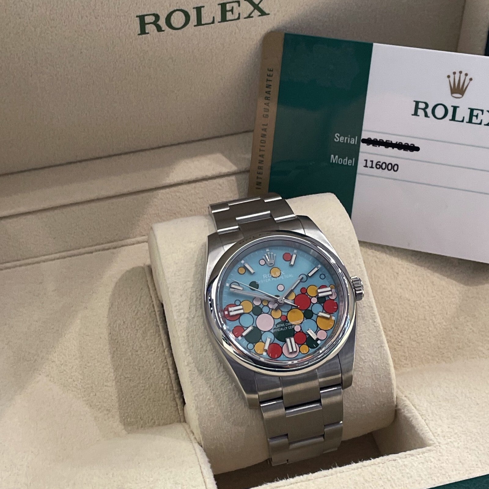ROLEX OYSTER PERPETUAL 36mm TURQUOISE BLUE CELEBRATION DIAL ref: 116000