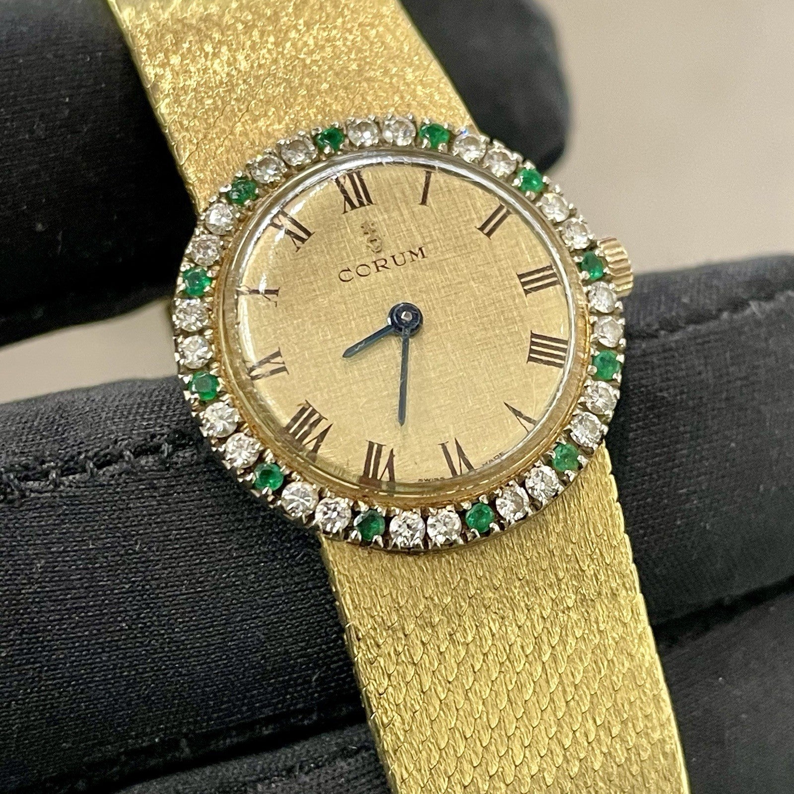 CORUM VINTAGE 24mm YELLOW GOLD DIAMONDS AND EMERALDS ref: 27307