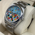 ROLEX OYSTER PERPETUAL 36mm TURQUOISE BLUE CELEBRATION DIAL ref: 116000
